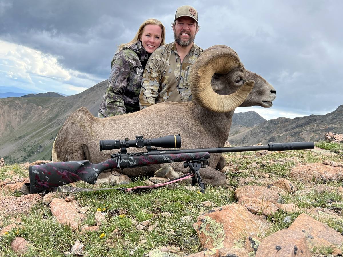Broc and Kendra Brimhall with a Rocky Mountain bighorn taken above timberline in Colorado